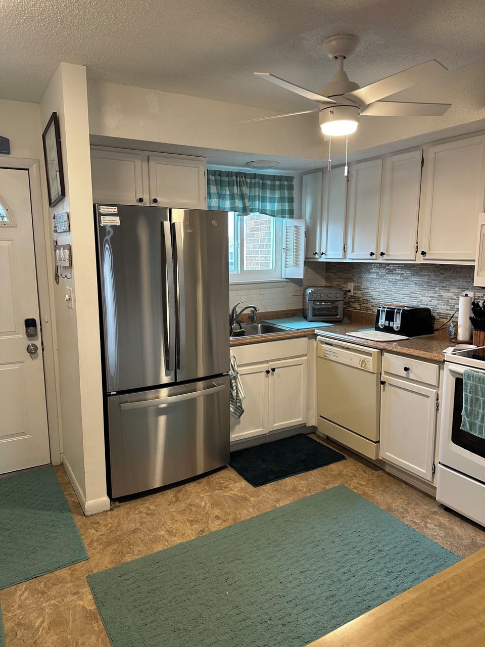 Kitchen right as you walk in.