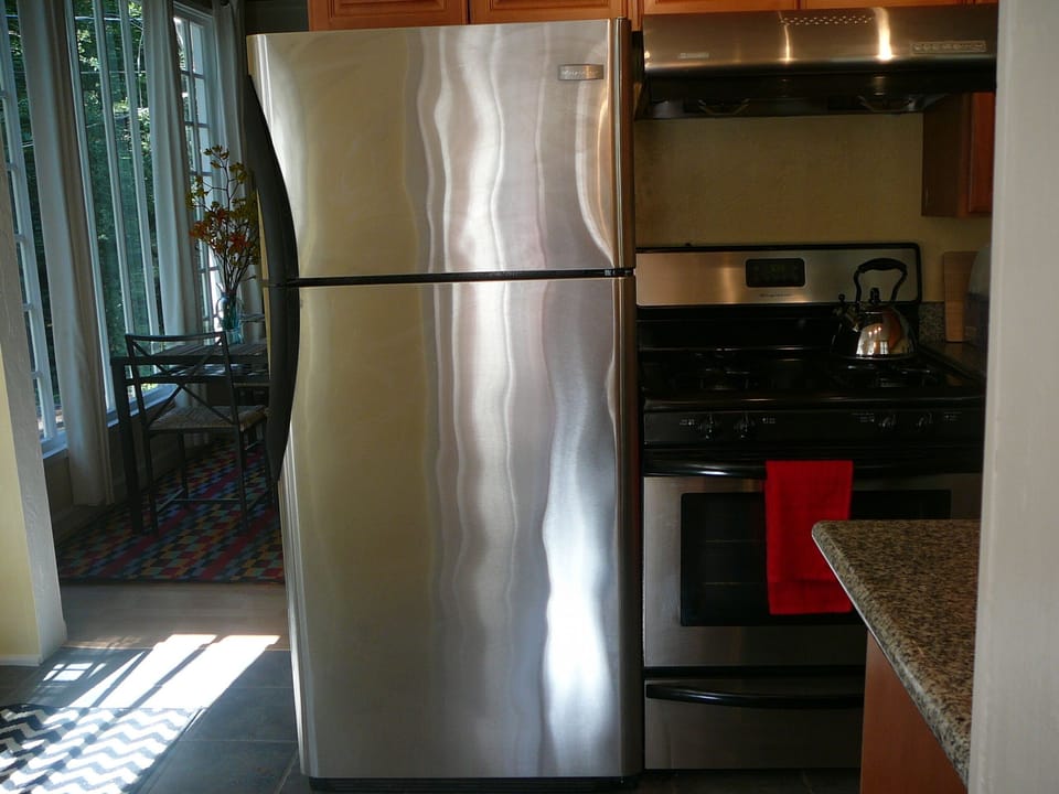 Top Floor Apartment:   Granite Kitchen with modern appliances and gas stove