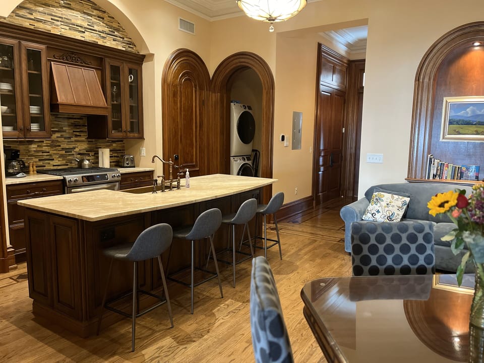 Laundry Room with full washer and dryer off Kitchen