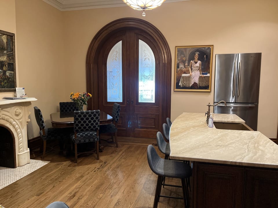Original pocket doors close for privacy.  View from Kitchen