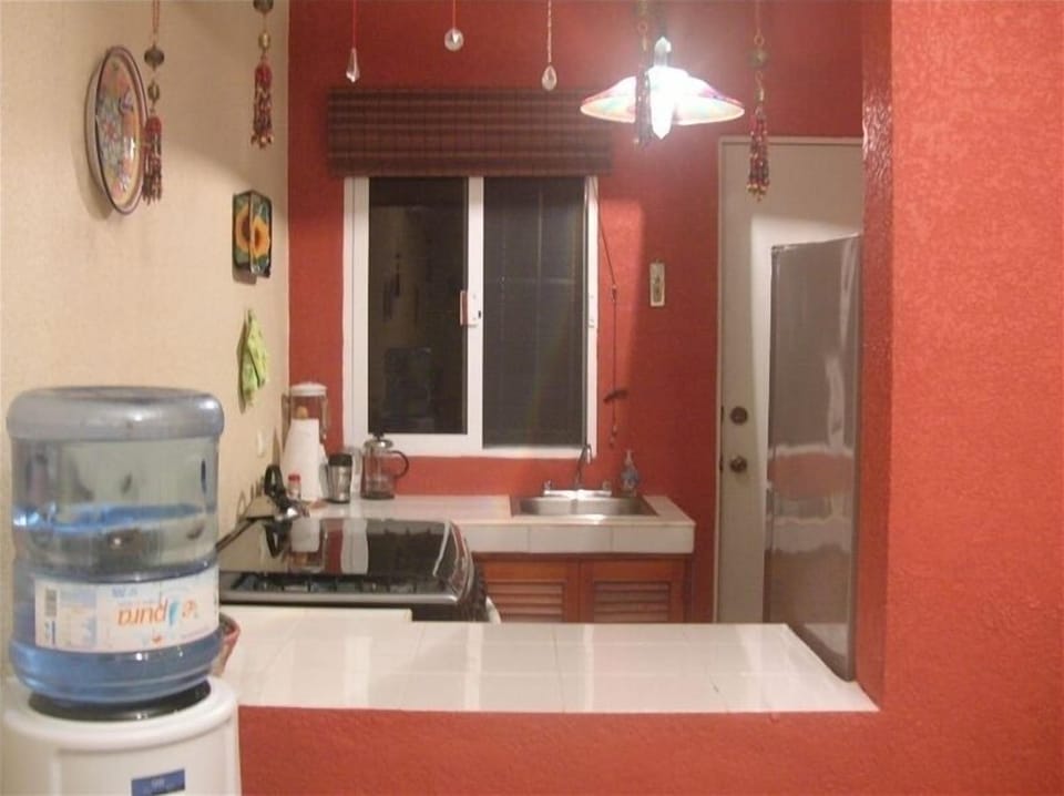 A view of our kitchen from the dining room.