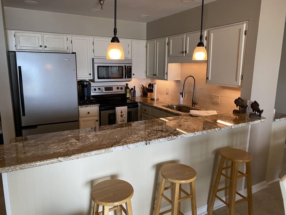 Breakfast bar with 3 stools