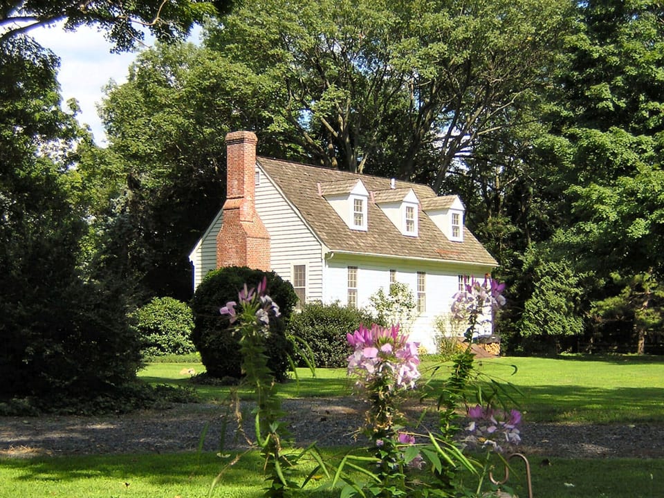 The Cottage in Summer from across the back lawn.