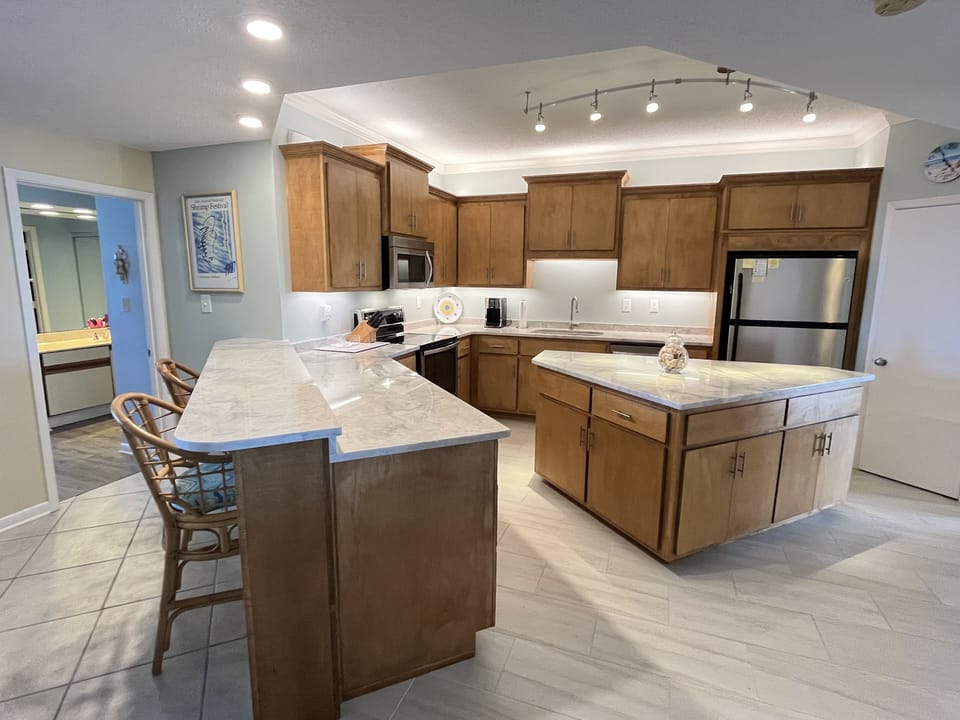 Breakfast bar and newly remodeled kitchen