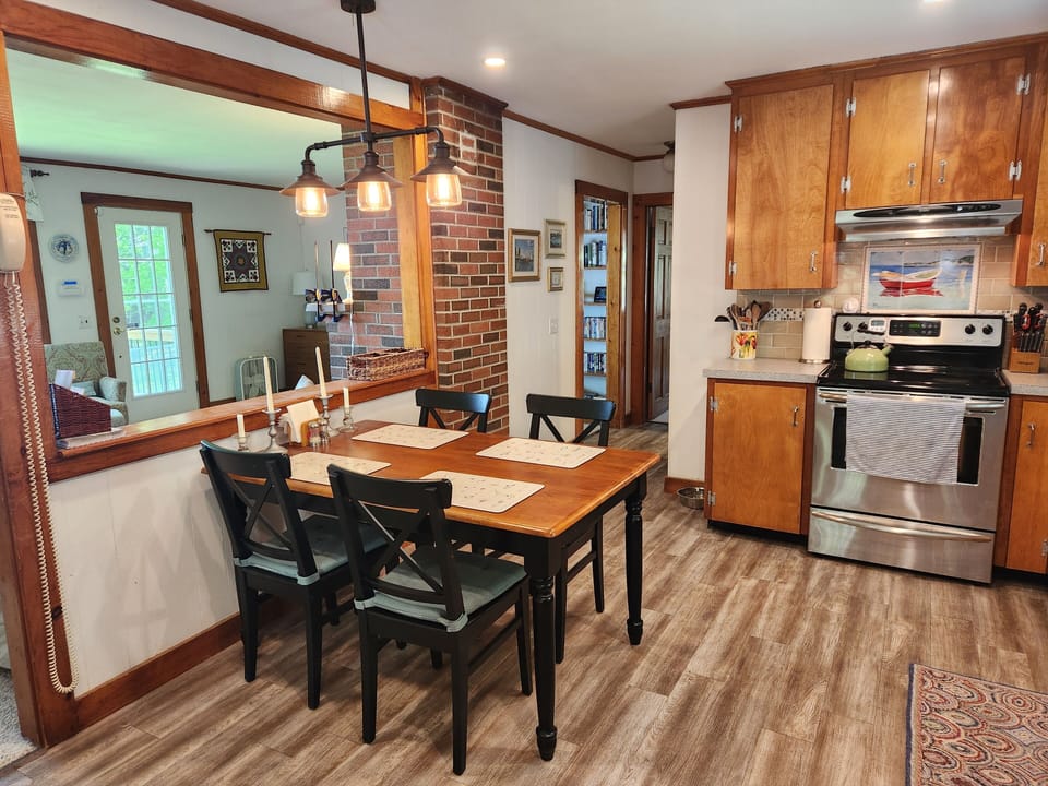 Eat in kitchen open to living room and view to the water.