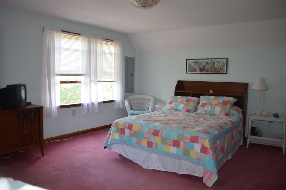 Second floor Master bedroom with queen size bed.