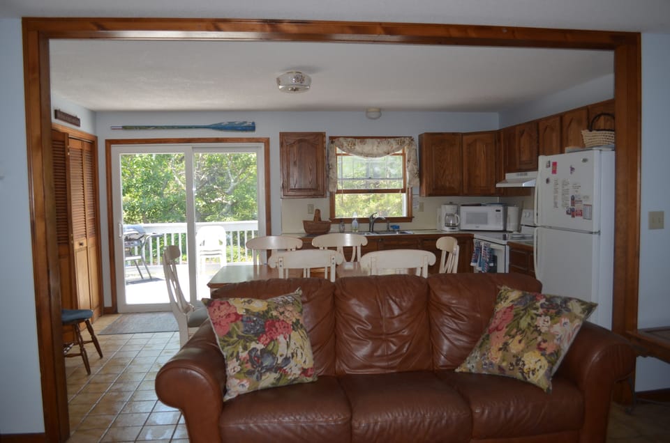 Open floor plan with kitchen, dining, living room and 1st floor washer/dryer.