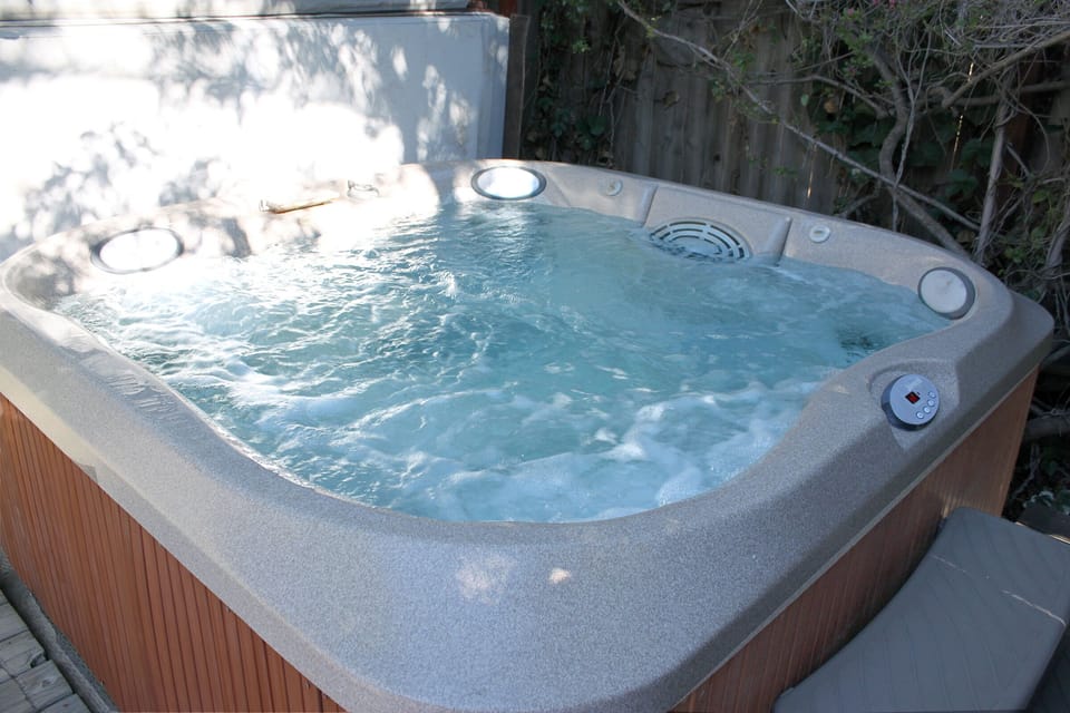 Hot tub seats six 