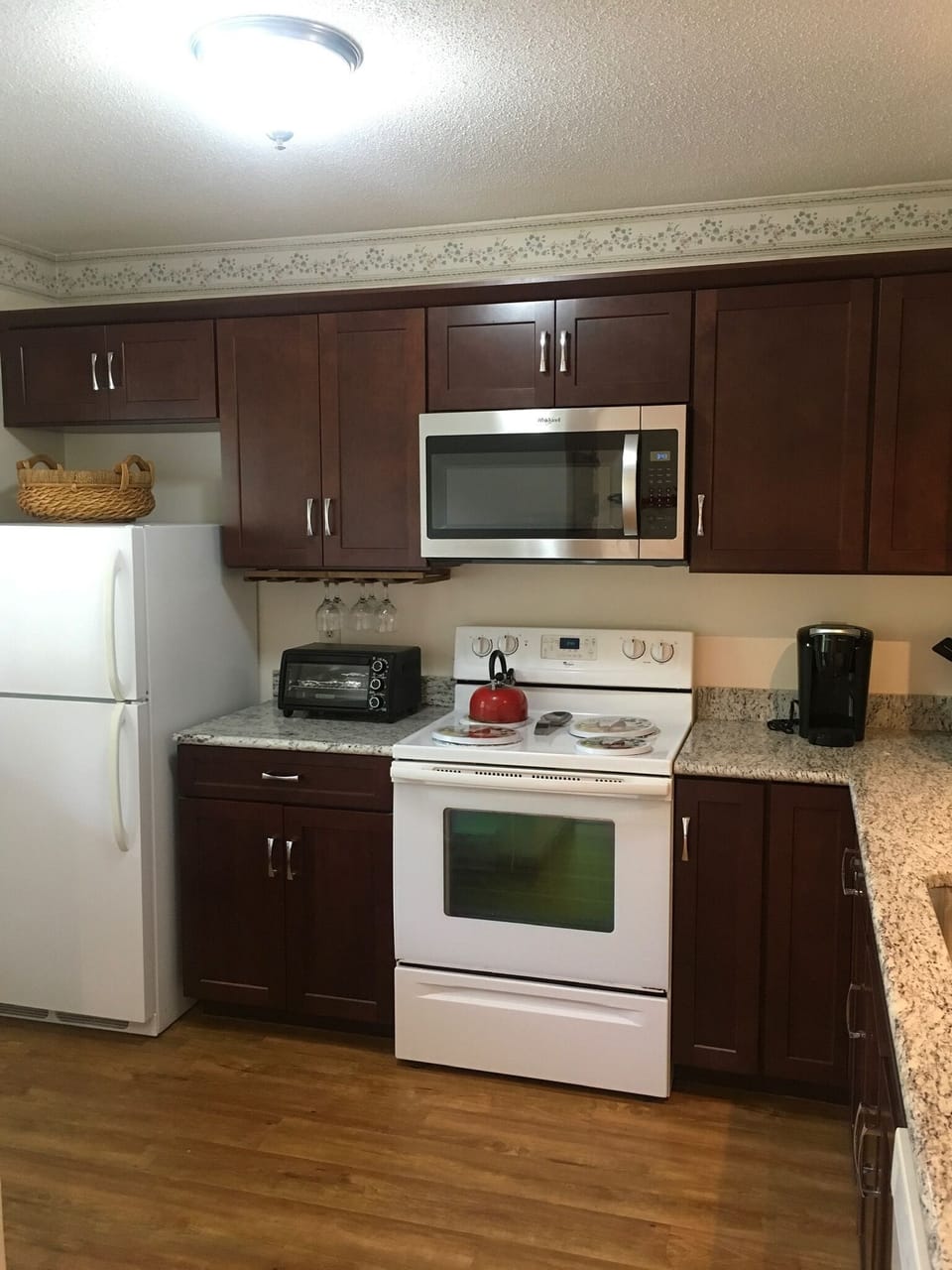 Refrigerator, stove, toaster oven, brand new microwave