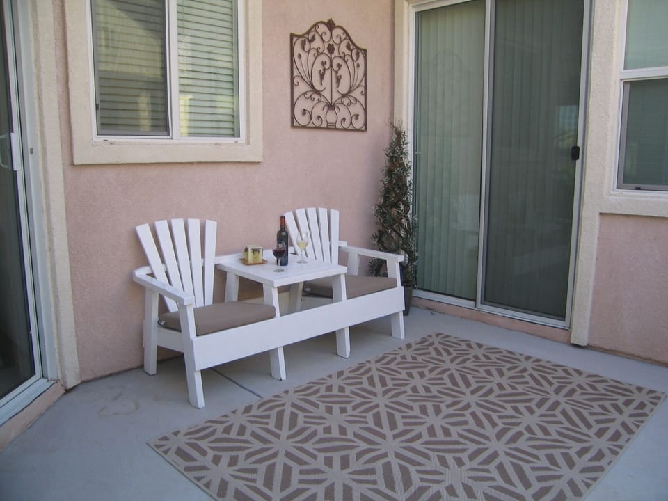 Side patio between living area and master bedroom