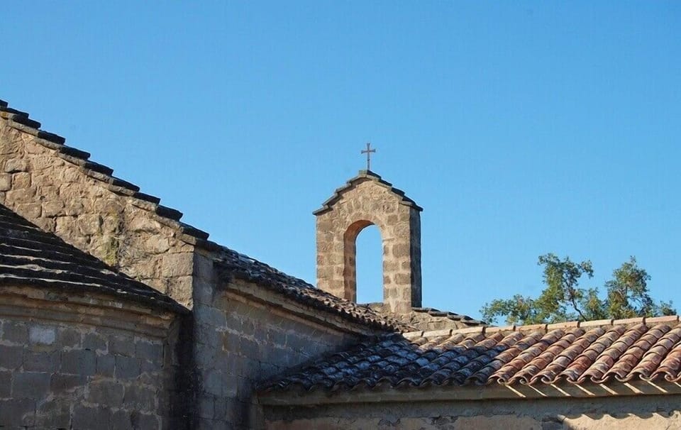 In the garden is an old churd from the 1300