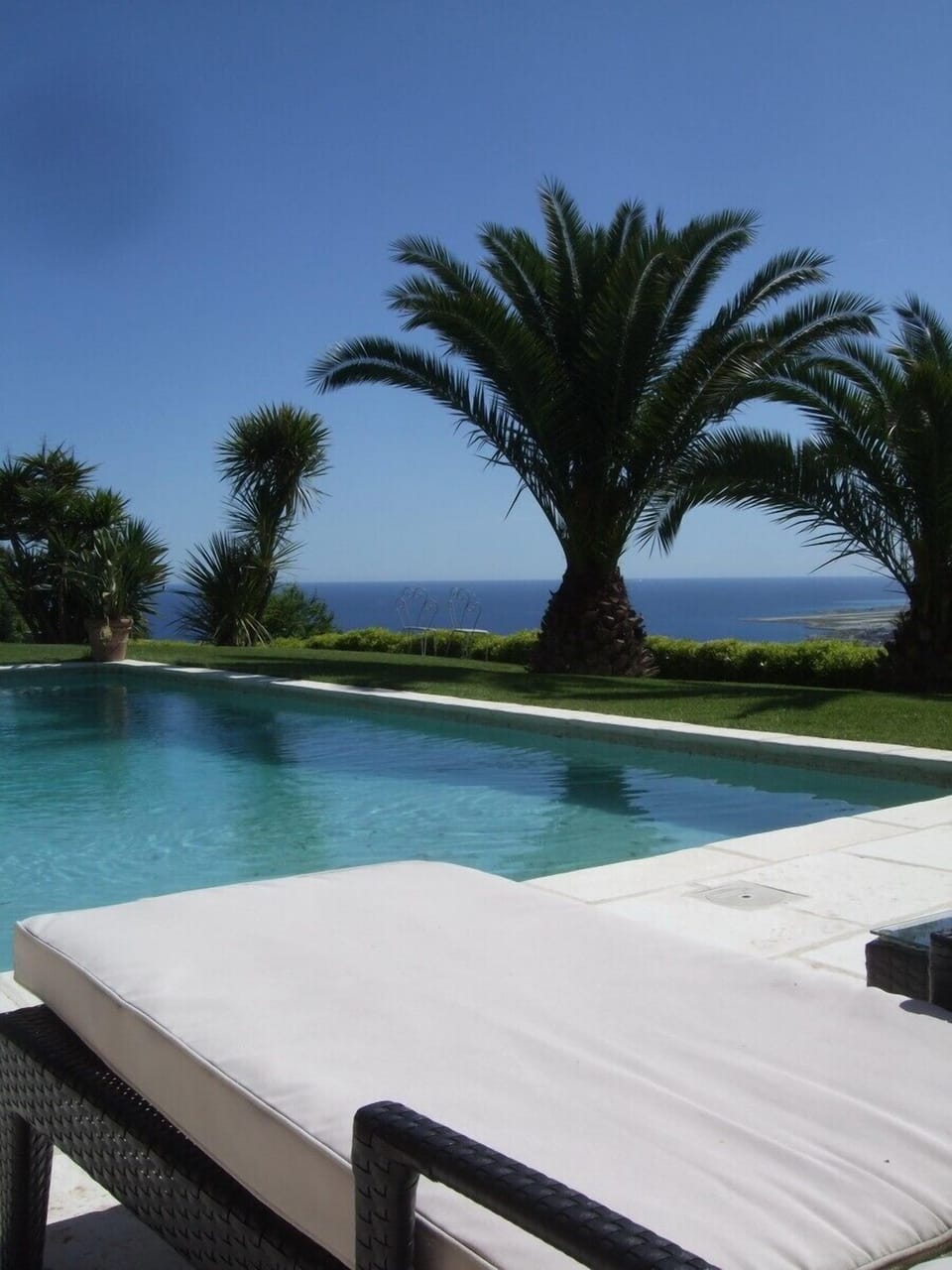 The pool over the blue Mediterranean sea