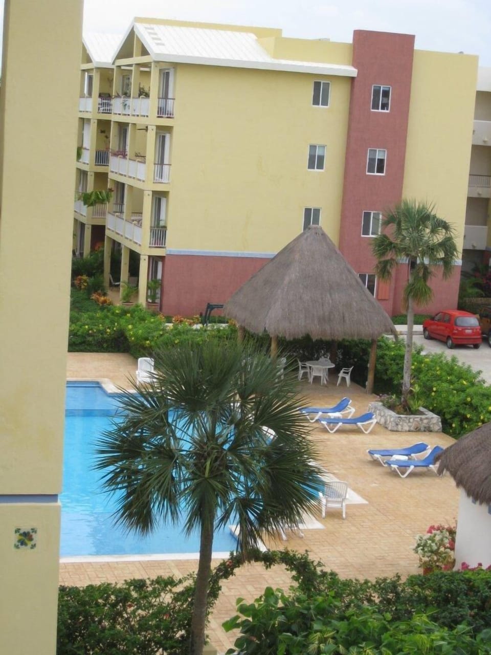 Keep an eye on the pool while relaxing on the patio.