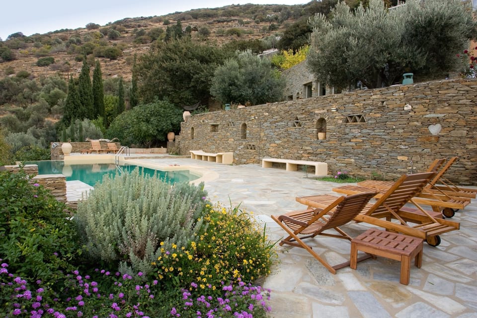 Pool area with teak sun lounges