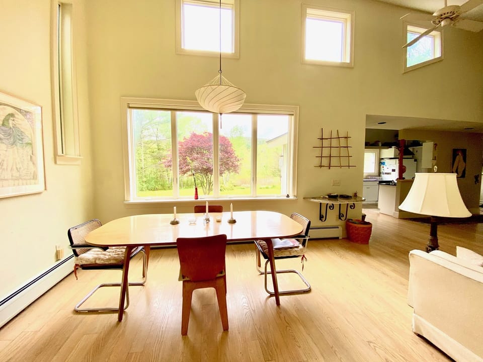 Dining area with cathedral ceiling 
with western views.