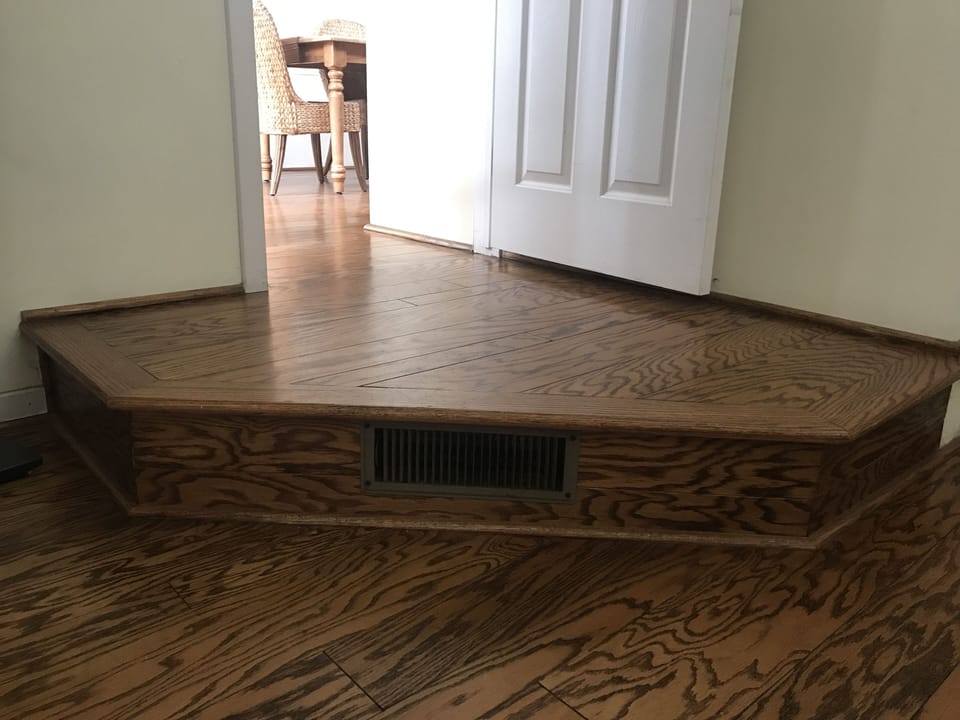 Small step down from dining area into master bedroom.