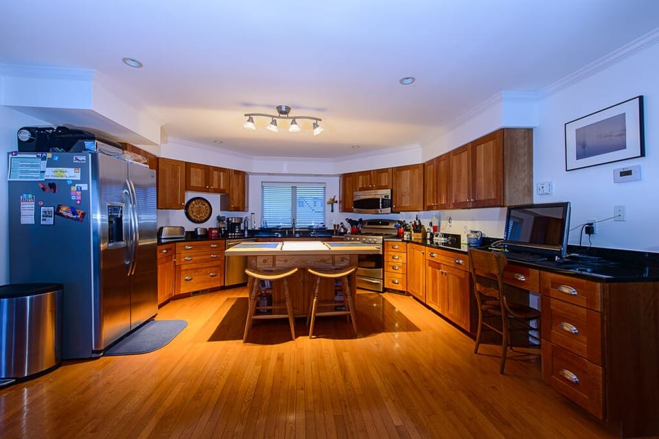 Kitchen shot by Mike Blanchette.  Ocean view out the window over the sink.