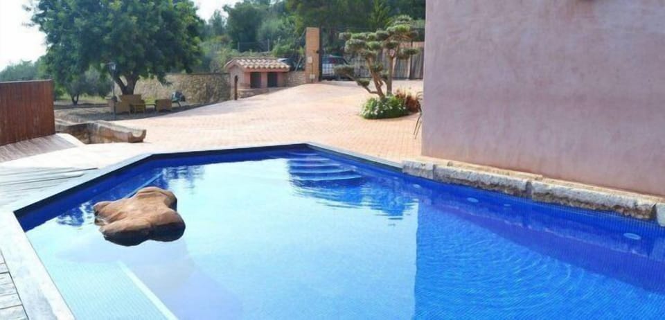 Masia dels Molineros' pool is a sure hit for kids who want to play