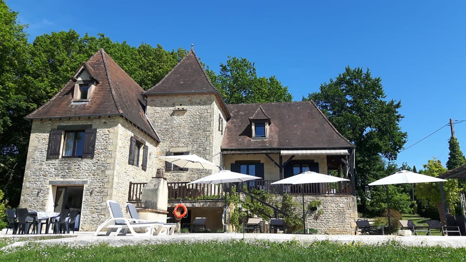 Perigordine style house with private pool looking over wooded valley