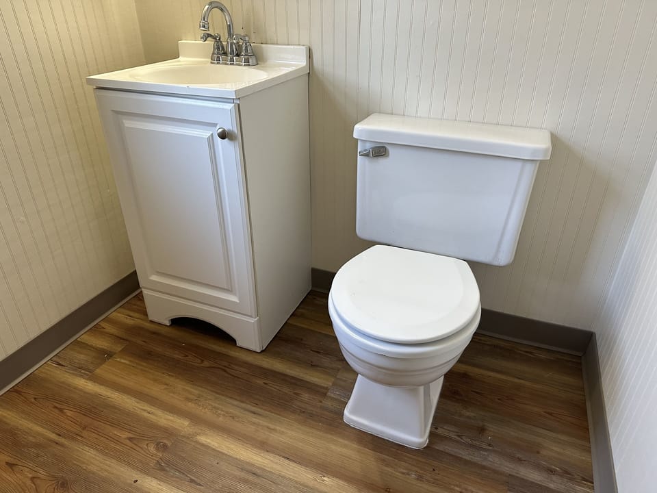 Upstairs bathroom has a tub/shower.