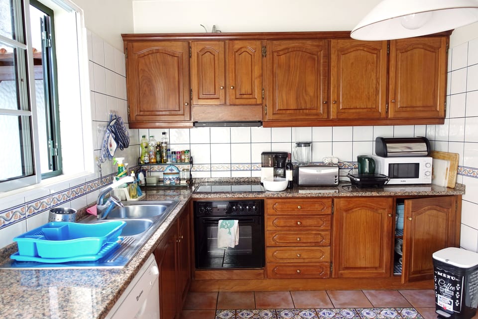 Internal kitchen. There is one more outside and one downstairs. 