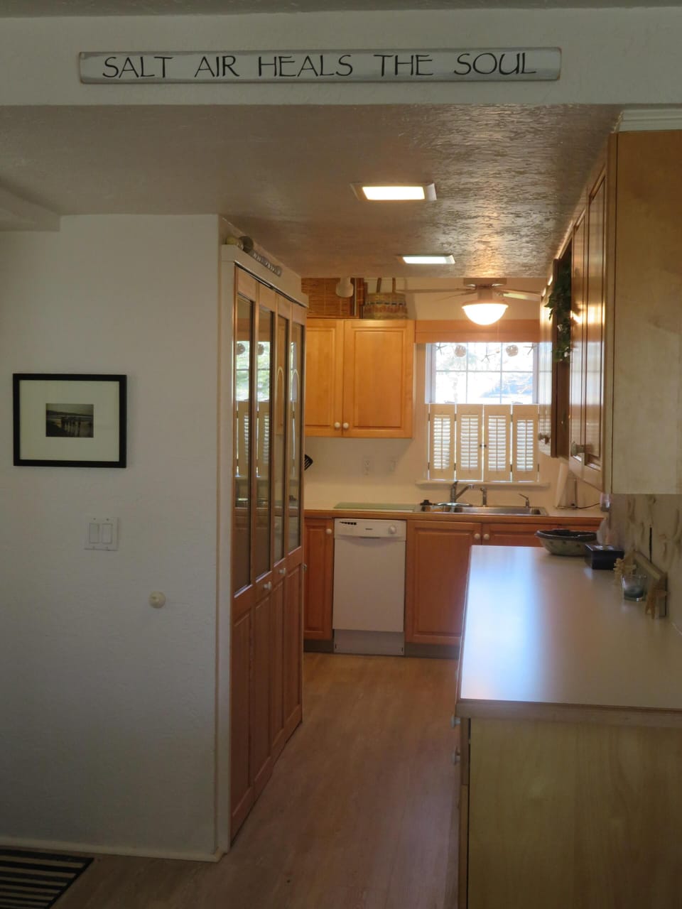 Laundry area on left behind doors