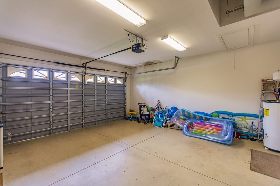 Garage open to guests, with beach gear, toys and inflatables