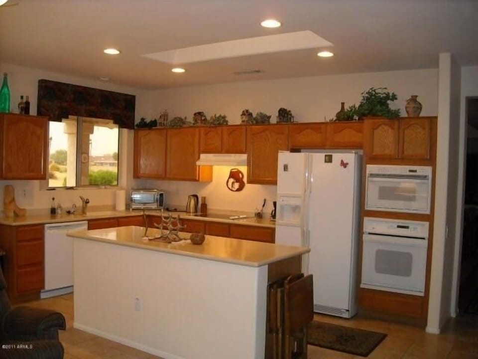 Upgraded kitchen is part of Arizona room.  New fridge April 2020.