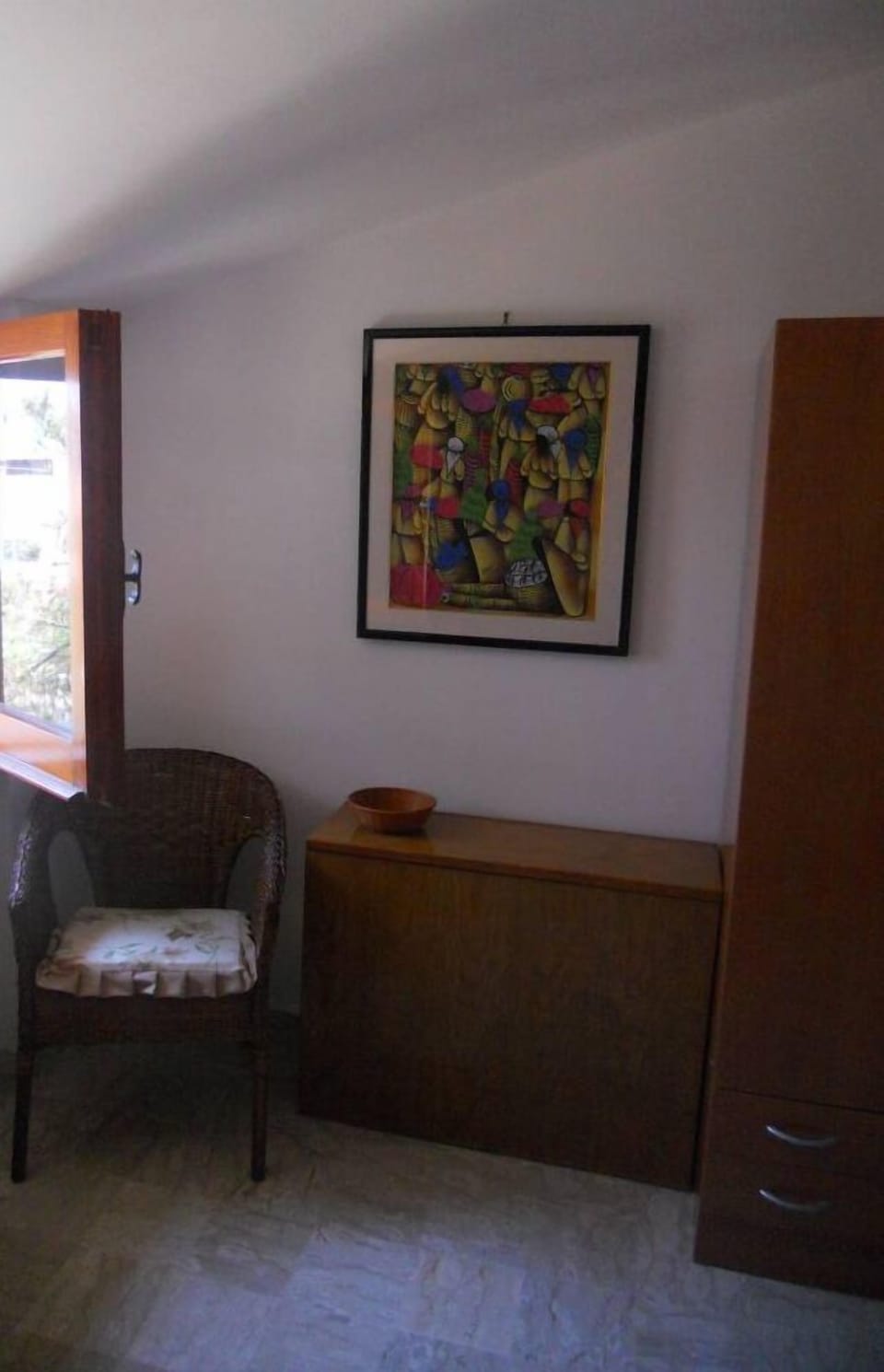 Right corner of the second single bedroom with sloping.