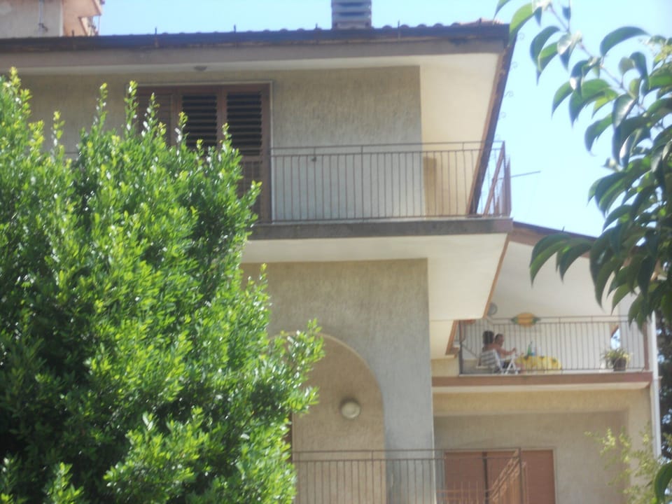 Outside of the apartment on the second floor.