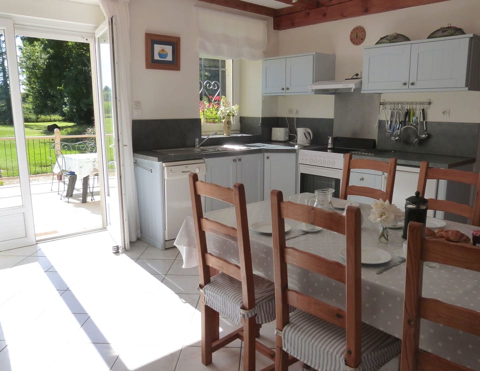 Spacious well equipped kitchen leading to terrace, for breakfast inside or out