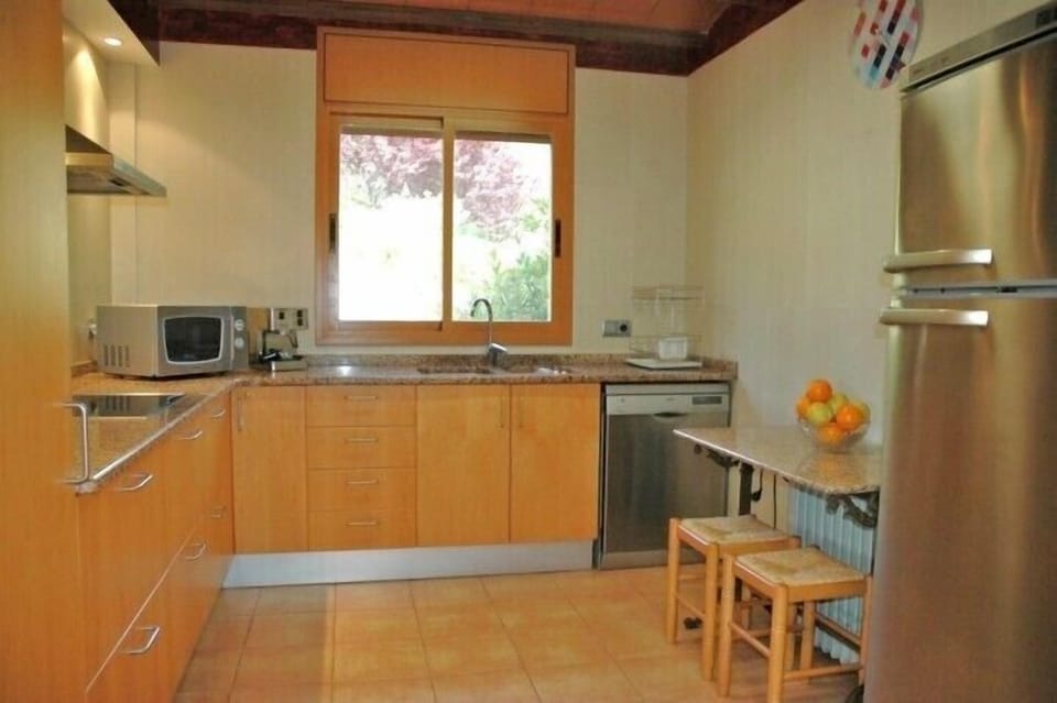 The kitchen is modern and has all modern facilitie