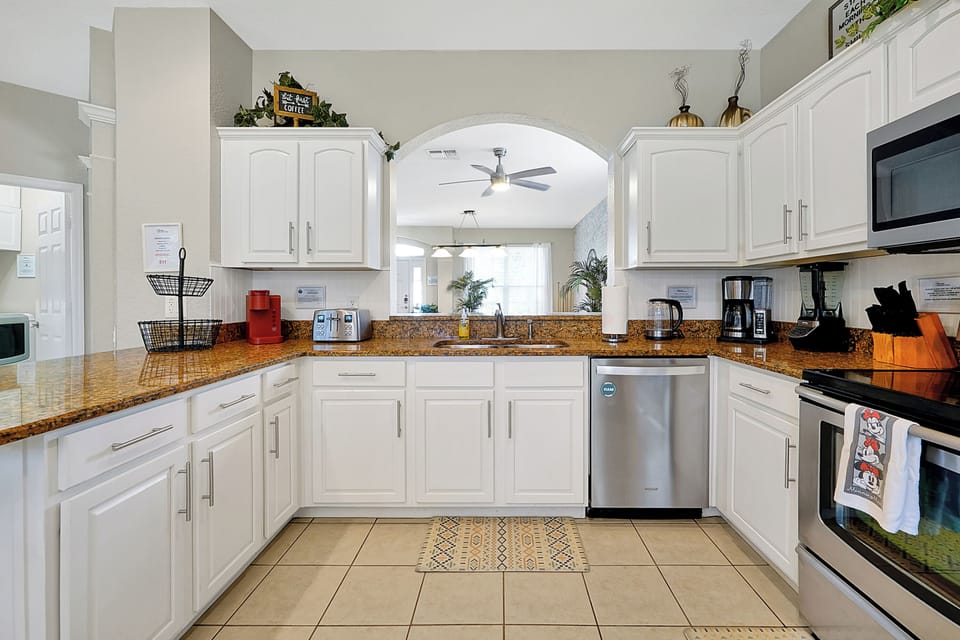 Open concept kitchen with views to lounge and family room and pool!