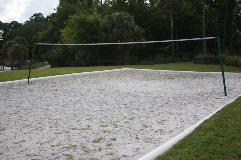 Play some beach volleyball with your friends and family...