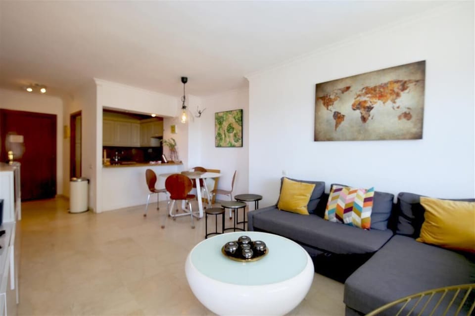 Full view of the lounge with dining area to the rear