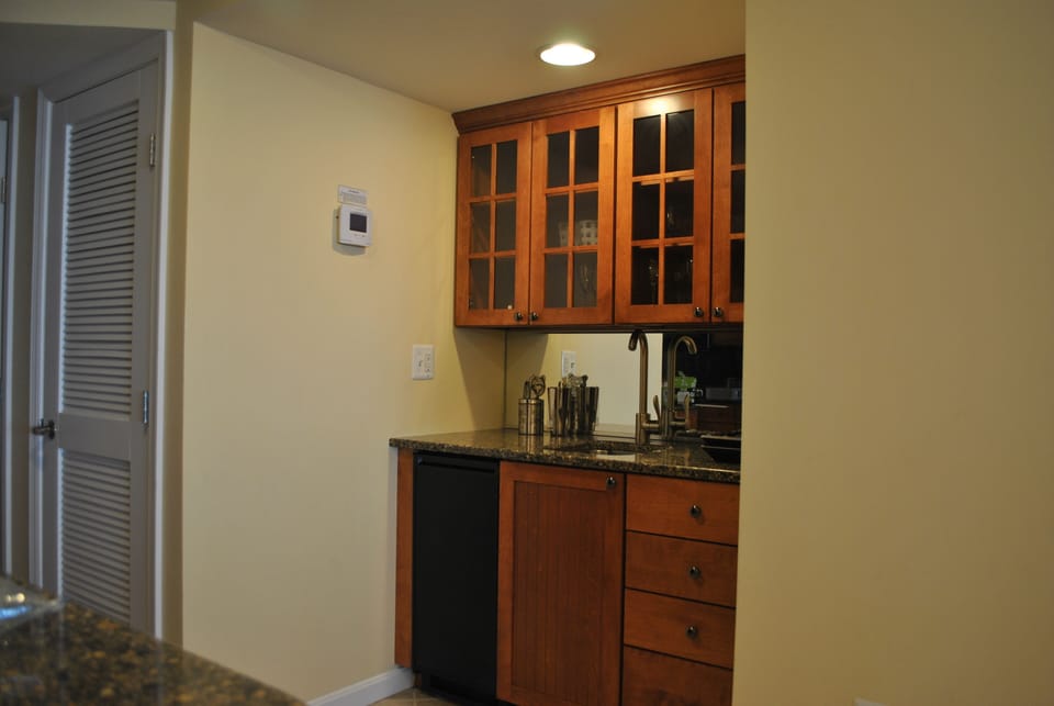 Full service wet bar with beverage cooler.