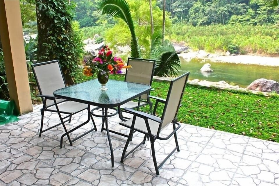 Lower patio with river view.