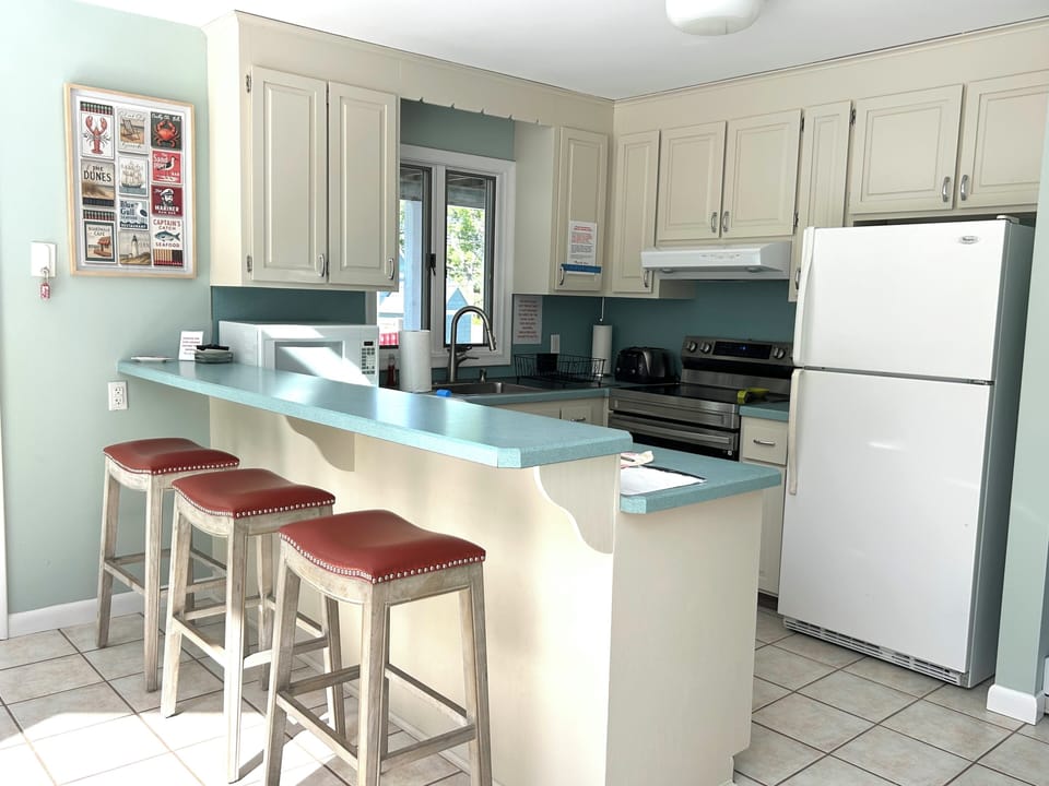 You won't miss any action with this open kitchen/dining/living area