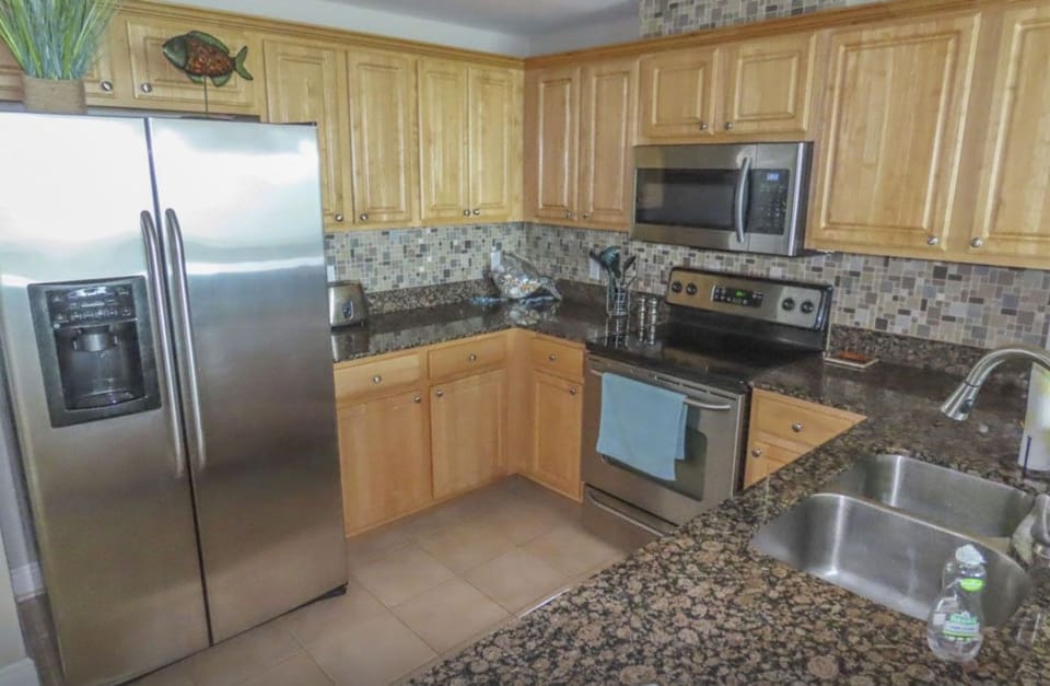  New stainless appliances in very well appointed kitchen. All the chef needs.