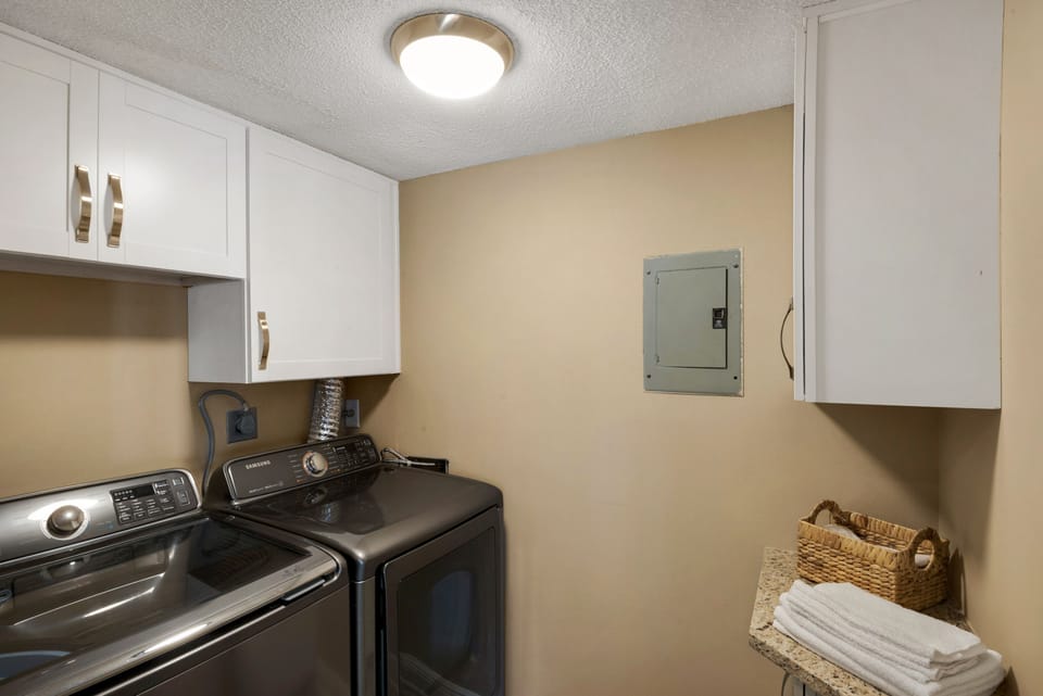 Laundry room adjacent kitchen