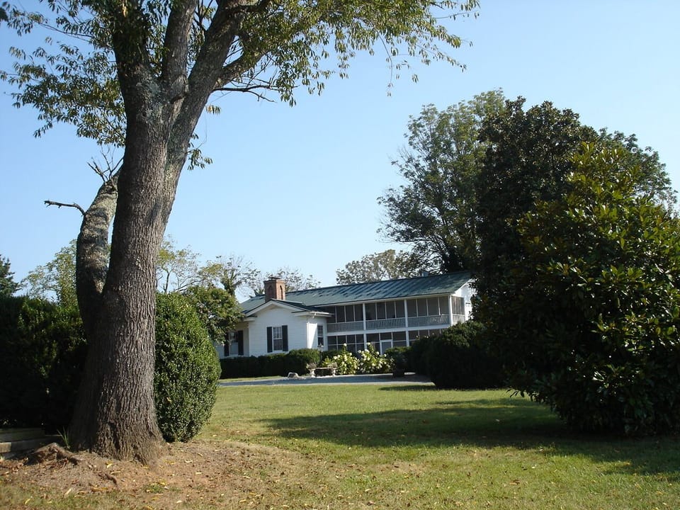 The Manor House; 4 bedrooms; 4 baths; hot tub on patio.