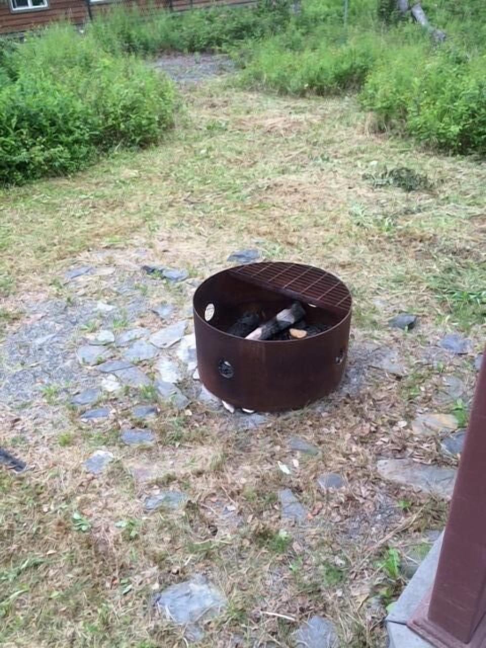 Fire pit with camp chairs available.