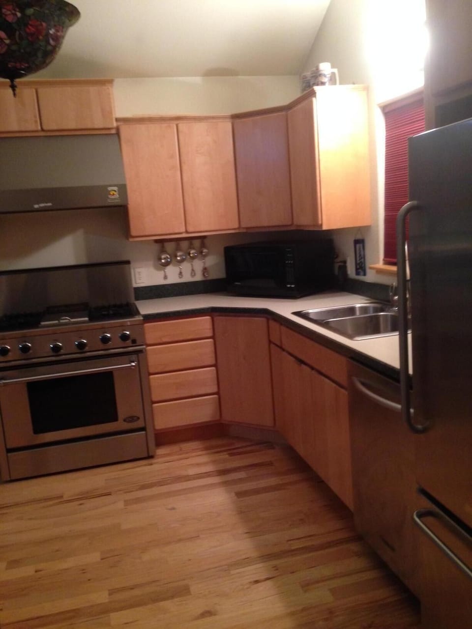 Kitchen also has dishwasher, refrigerator and freezer with ice maker.