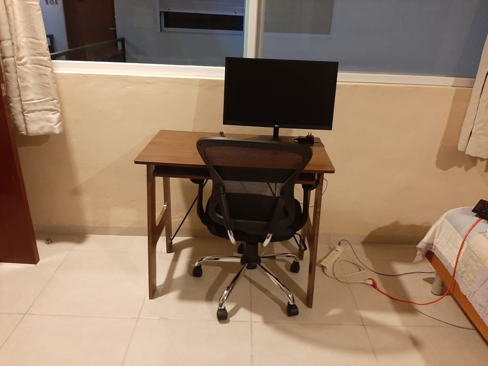 computer desk, and monitor 
