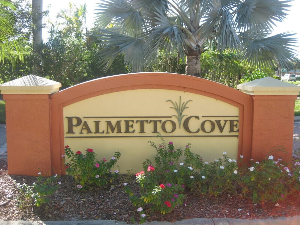 Entrance from Cypress Lake Drive to main gate.
