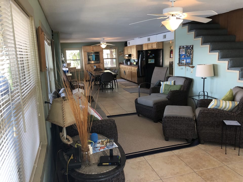 Large open downstairs living into kitchen and dining.