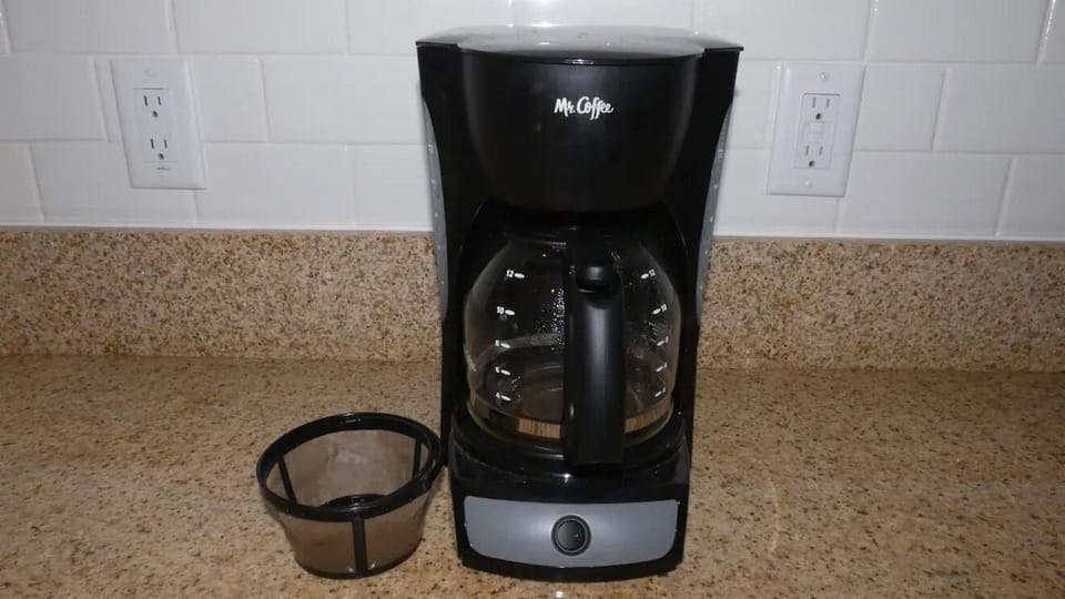 Coffee pot with gold filter