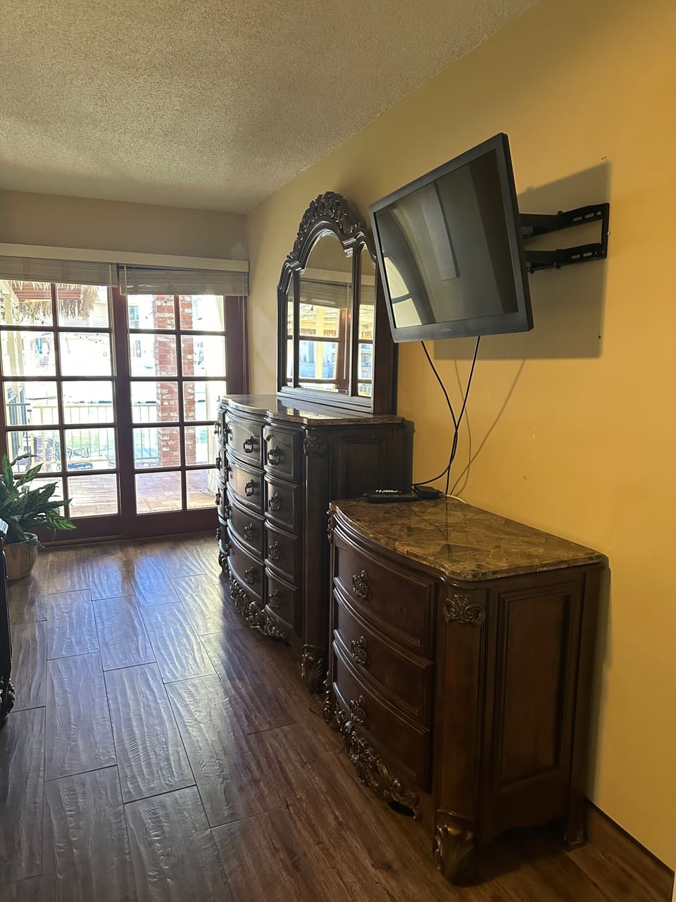 Master has doors going out to patio and has view of water