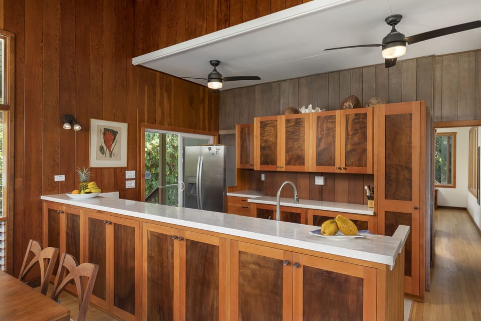 Custom built Koa kitchen cabinets