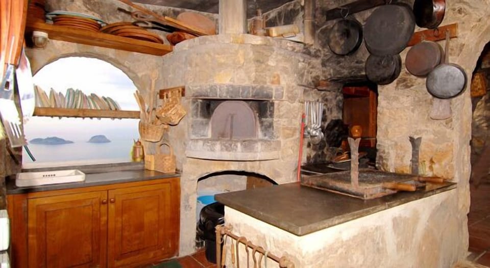 Seafront external Kitchen with Wood-fire Pizza Oven, Wood Stove, Barbecue